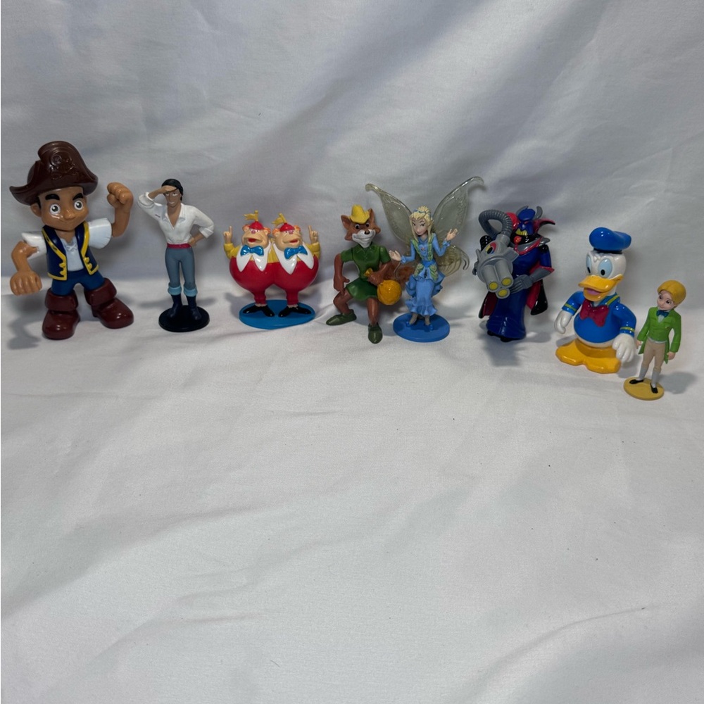 RANDOM DISNEY FIGURE LOT. DONALD DUCK, ZURG, PRINCE ERIC, TWEEDLE DEE & DUM, ETC